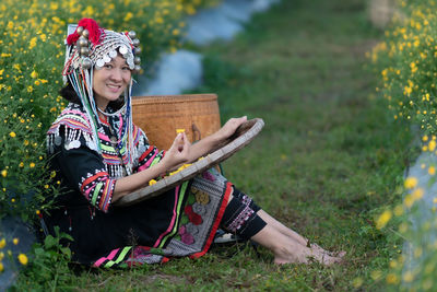 Woman sitting on a field