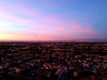 High angle view of townscape against sky during sunset