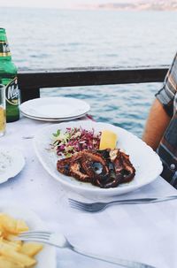 Food on table at sea shore