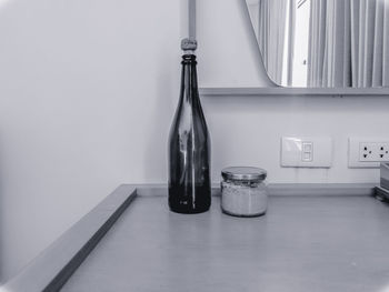 Close-up of wine glass on table at home