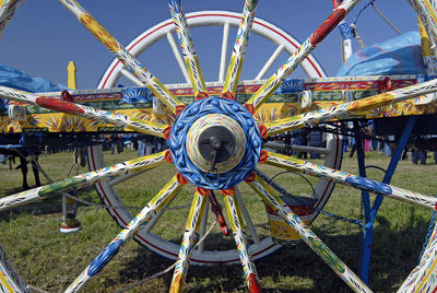 Ferris wheel in park against sky