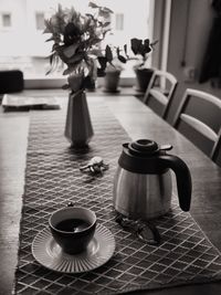 Close-up of coffee cup on table