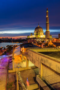 High angle view of illuminated buildings against sky