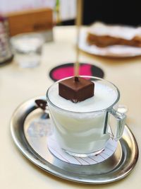 Close-up of coffee cup on table