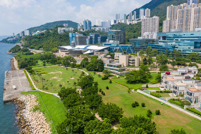 High angle view of buildings in city against sky