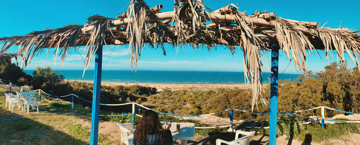 Scenic view of sea against blue sky