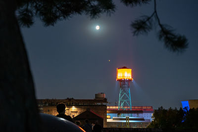 Low angle view of water tower against sky at night, totale mondfinsternis, bochum