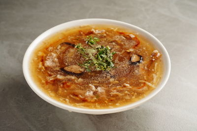 Close-up of soup in bowl on table