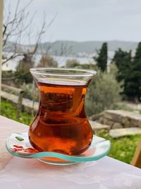 Close-up of tea in glass on table