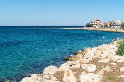 Scenic view of sea against clear sky