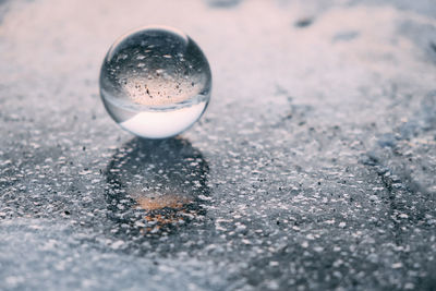 Close-up of ice cream on wet glass