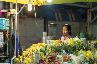 Woman looking at market stall