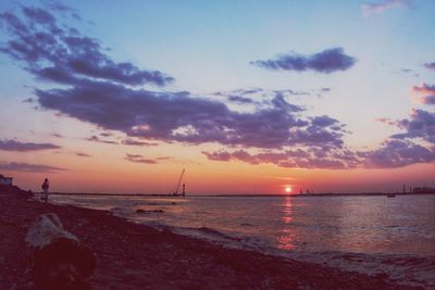 Scenic view of sea at sunset