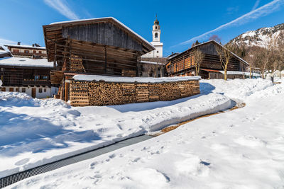 Historic village of sauris di sotto in the snow. winter dream. italy