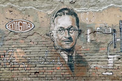 Close-up of graffiti on brick wall