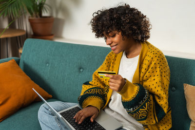 Young man using laptop