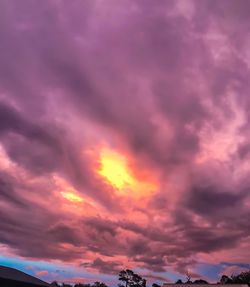 Low angle view of dramatic sky during sunset