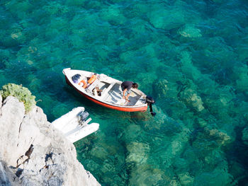 High angle view of man on boat sailing in sea