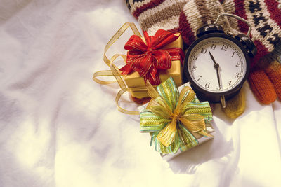 High angle view of clock on table