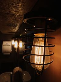 Close-up of illuminated electric lamp