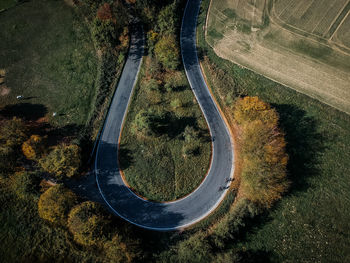 High angle view of tire tracks on road