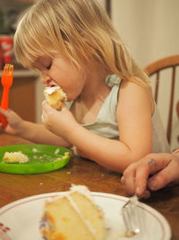 Child eating cake