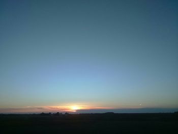 Scenic view of sunset over landscape
