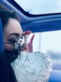 Close-up portrait of man wearing sunglasses