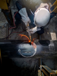 Close-up of worker working in factory