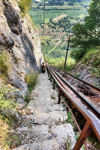 Railroad track amidst rocks