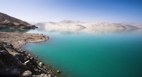 Panoramic view of lake and mountains against sky