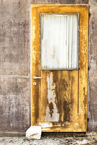 Closed door of old abandoned building