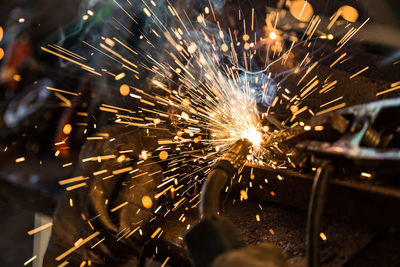 Close-up of sparkler at night