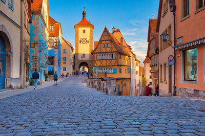 View of street amidst buildings in town