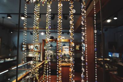 Close-up of necklaces at jewelry store