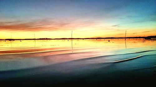 Scenic view of sea at sunset