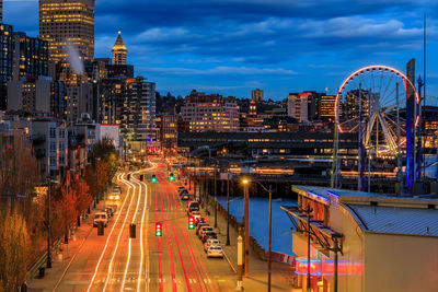 High angle view of light trails on road at night