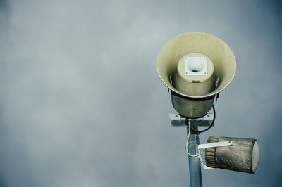 Close-up of megaphone against sky