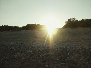 Scenic view of landscape against sky during sunset