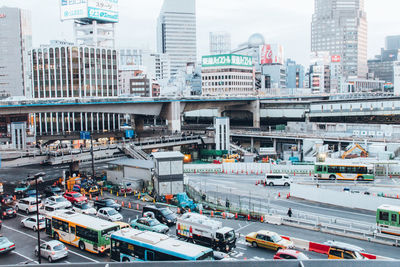 High angle view of vehicles on road in city