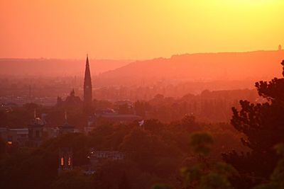 Scenic view of mountains against sky at sunset