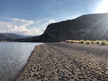 Scenic view of beach against sky