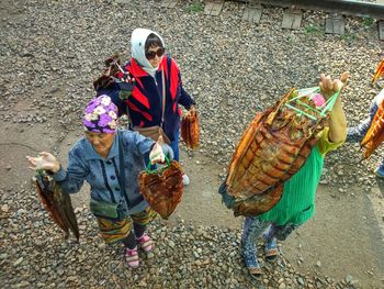 High angle view of girl holding basket