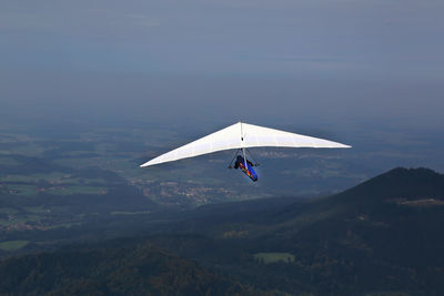 Hang glider flying in the german alps