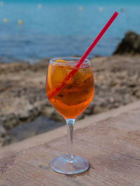 Close-up of wineglass on table