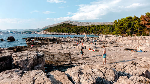 Scenic view of sea against sky with people. lokrum, croatia