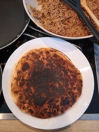 High angle view of bread in bowl on table