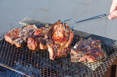 Close-up of meat on barbecue grill