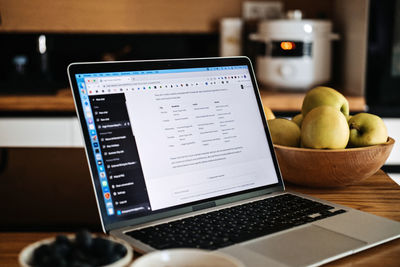 Close-up of laptop on table