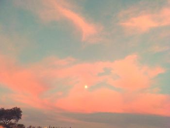 Low angle view of dramatic sky during sunset